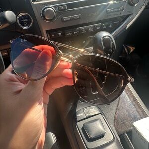 Brown Ray-Ban sunglasses! Worn maybe 6 times max. Good fit for any face type.